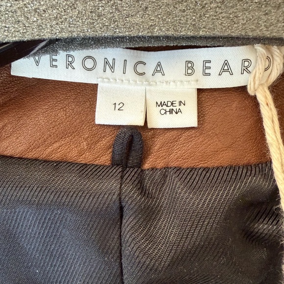 Veronica Beard
Miller Leather Dickey Jacket
NWT
SIZE 12 - Picture 13 of 15
